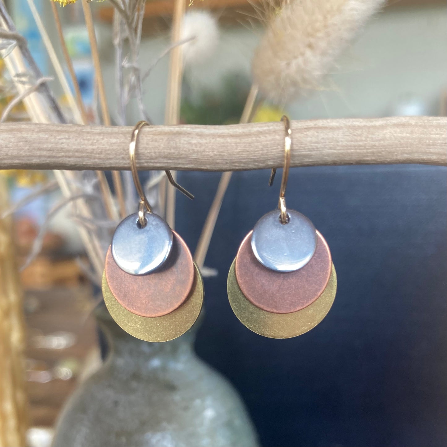 Cascade Earrings, featuring copper, brass and steel.