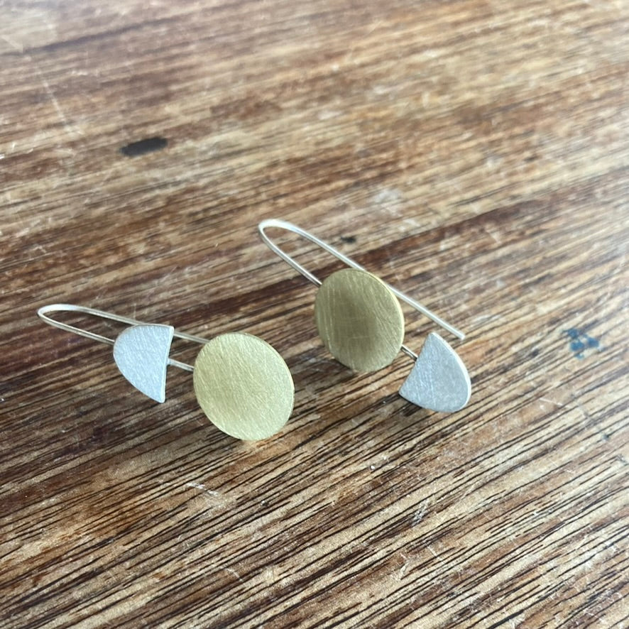 Lessons in Geometry. Same, same but different. Our fabulous geometric earrings with a twist. Sterling silver and brass.