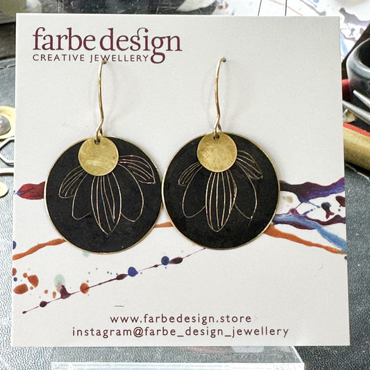 Swinging sisters: black patina metal flowers dangle earrings with brass discs