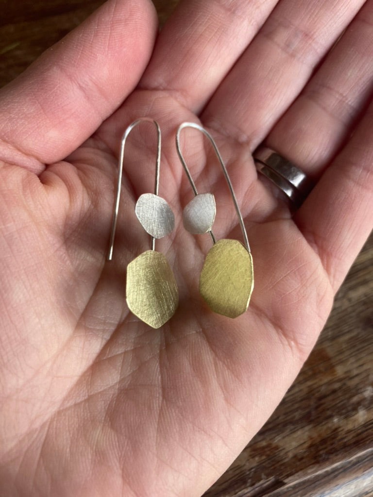 Dancing Cloud Earrings, sterling silver and brace. A delightful add of sophistication to any wardrobe choice.