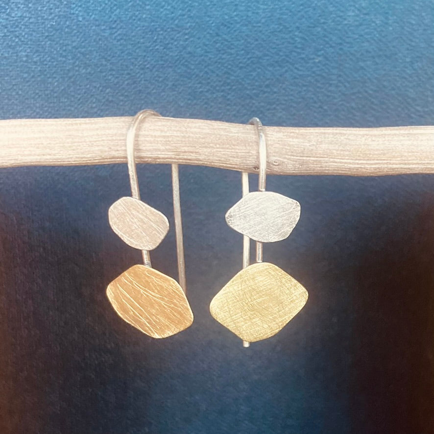 Dancing Cloud Earrings, in sterling silver and brass. A delightful add of sophistication to any wardrobe choice. Size Petit.