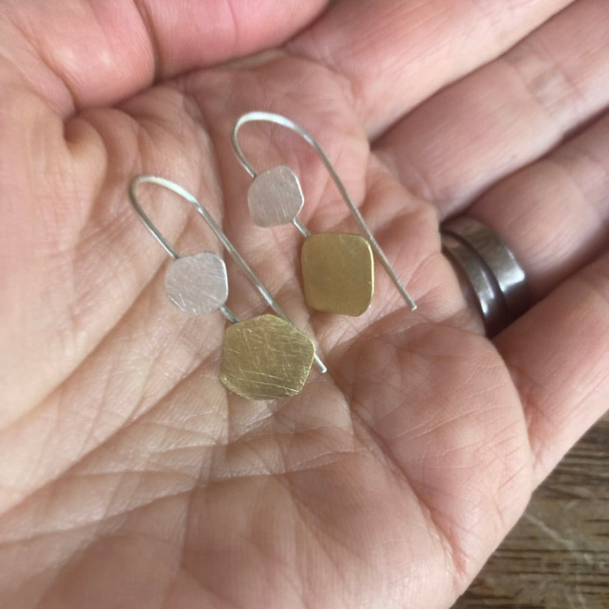 Dancing Cloud Earrings, in sterling silver and brass. A delightful add of sophistication to any wardrobe choice. Size Petit.