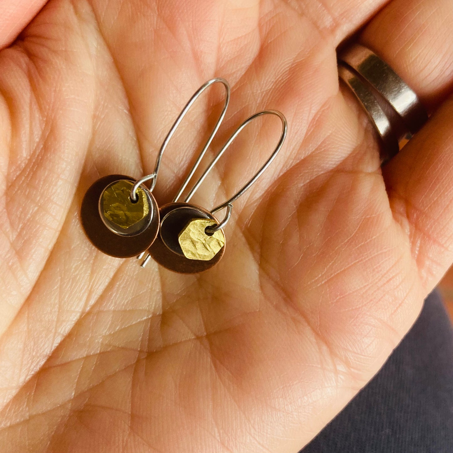 Cascade Earring with beaten brass hexagon detail. Fab go to earring, with steel hooks.