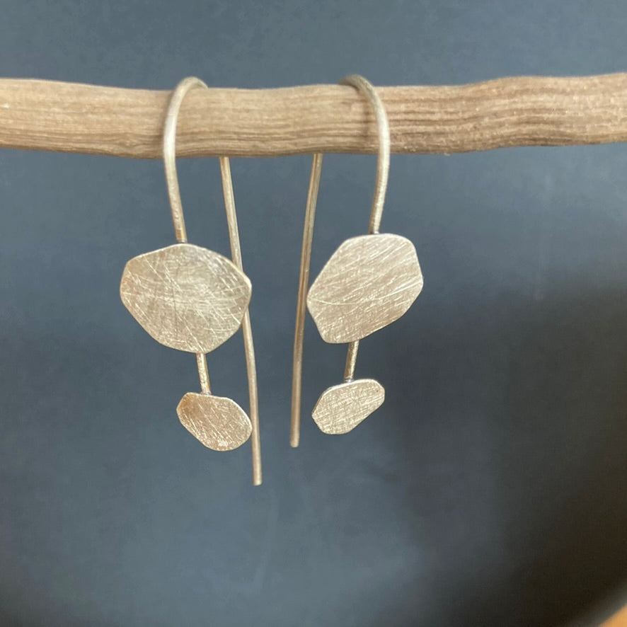 Dancing Cloud Earrings, in sterling silver. A sophisticated staple to any wardrobe choice.