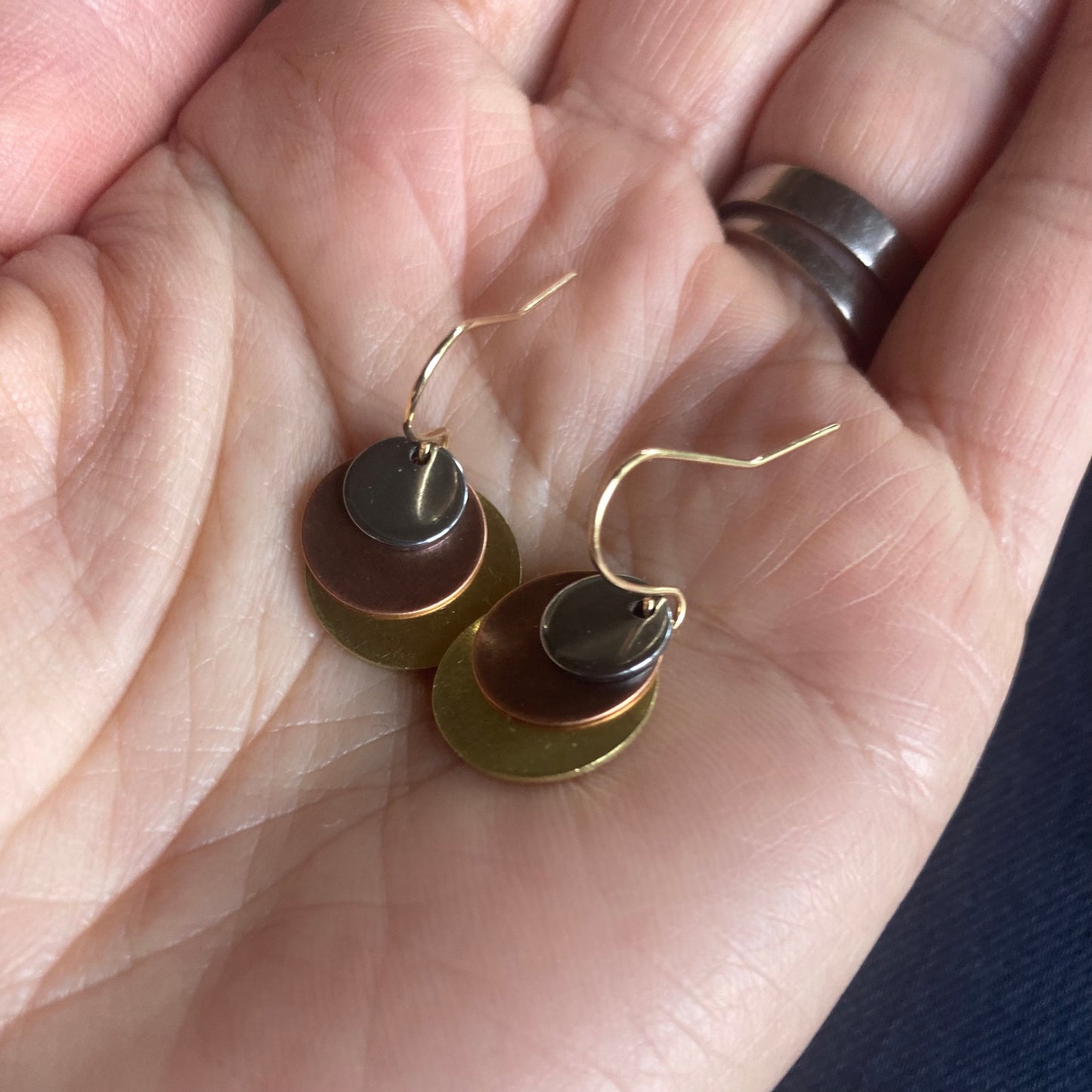 Cascade Earrings, featuring copper, brass and steel.