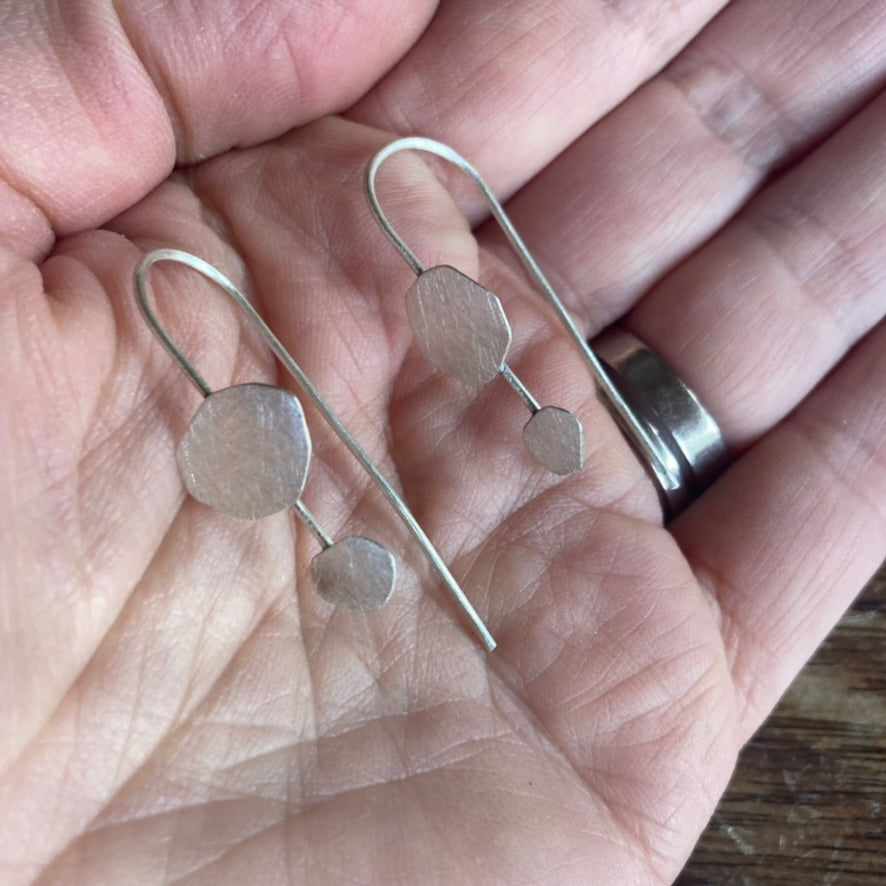 Dancing Cloud Earrings, in sterling silver. A sophisticated staple to any wardrobe choice.