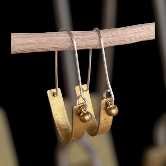 Swinging Sisters, brass and sterling hoop earrings. Featuring embossed detail and brass drop for extra fabulousness.