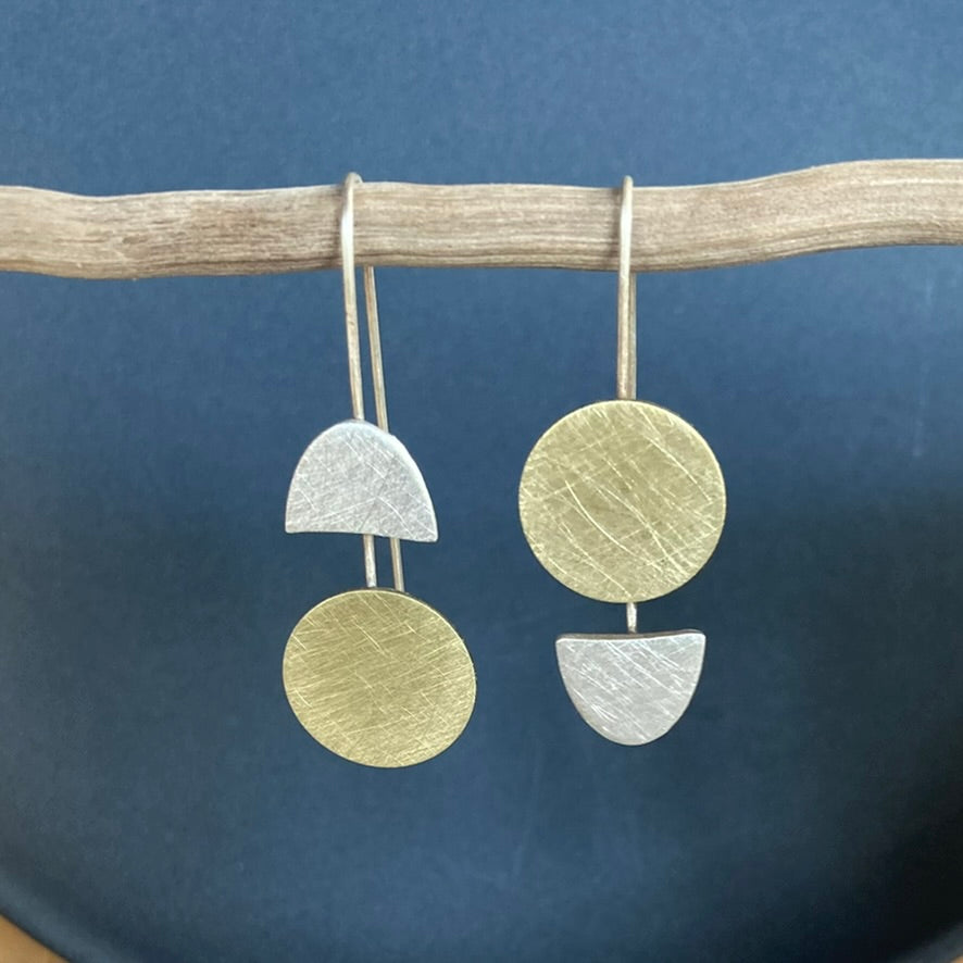 Lessons in Geometry. Same, same but different. Our fabulous geometric earrings with a twist. Sterling silver and brass.