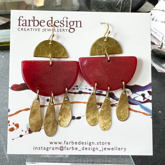 Swinging Sisters: ruby red dangles with brass details