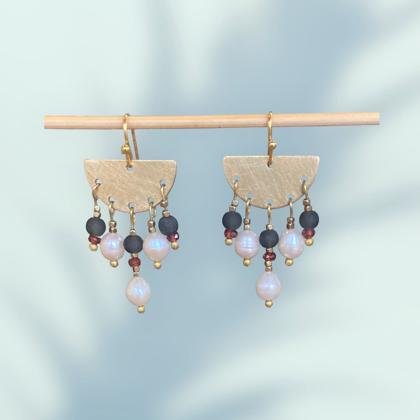 Ooh La La earrings. Featuring fancy fresh water pearls, garnet and glass beads. Gold plated earring hooks.