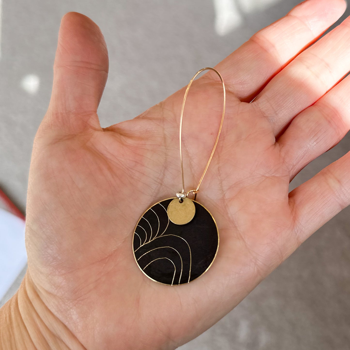 Wanderers: hand etched discs on black patina with brass details