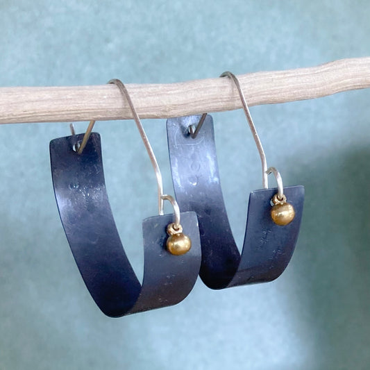 Swinging Sister - Oxidised sterling silver large hoop earring, feature embossed detail and brass drop.