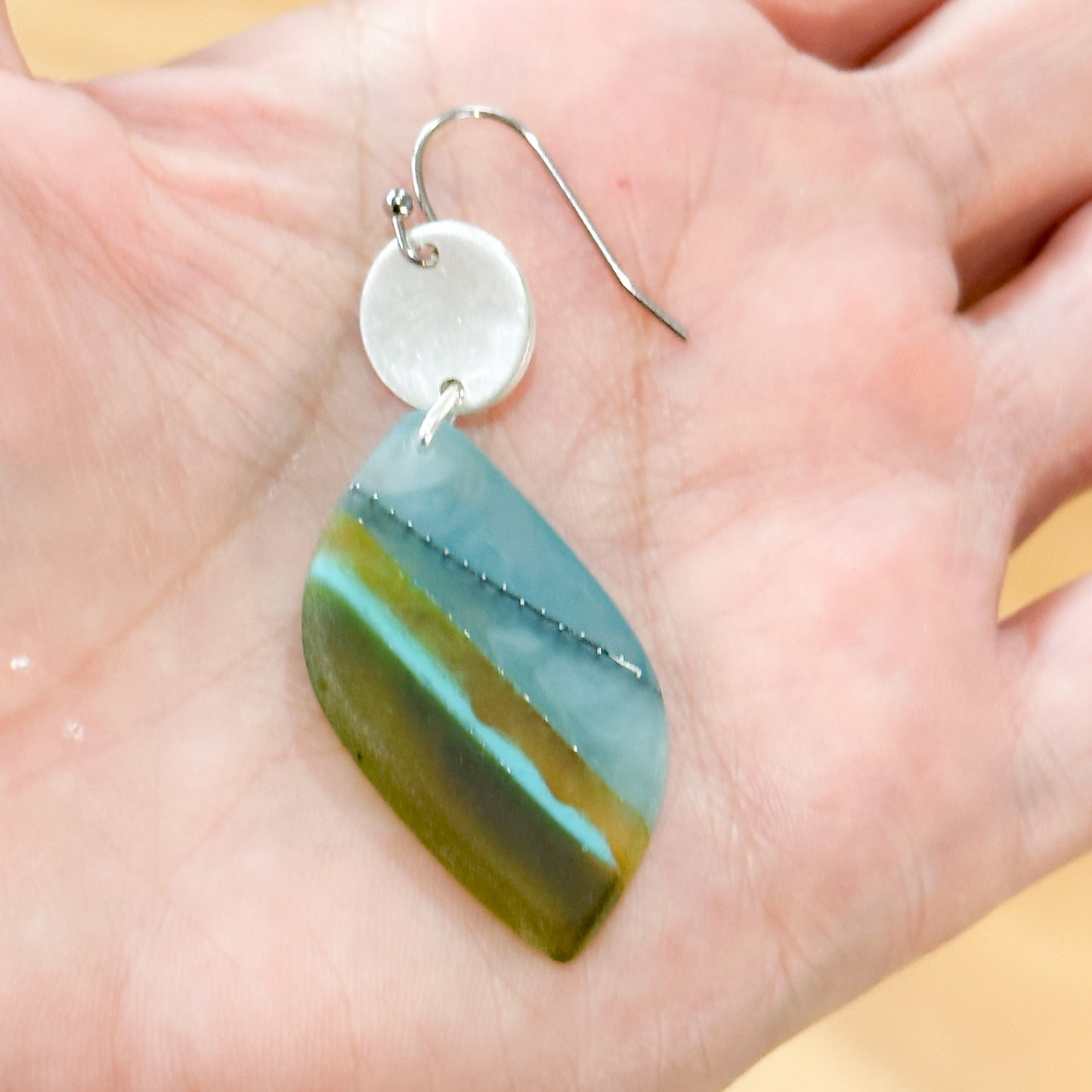 Walkerville wandering; Bio-resin drop earrings with sterling silver discslayers of oceanic blue, green and turquoise reminiscent of coastal landscapes