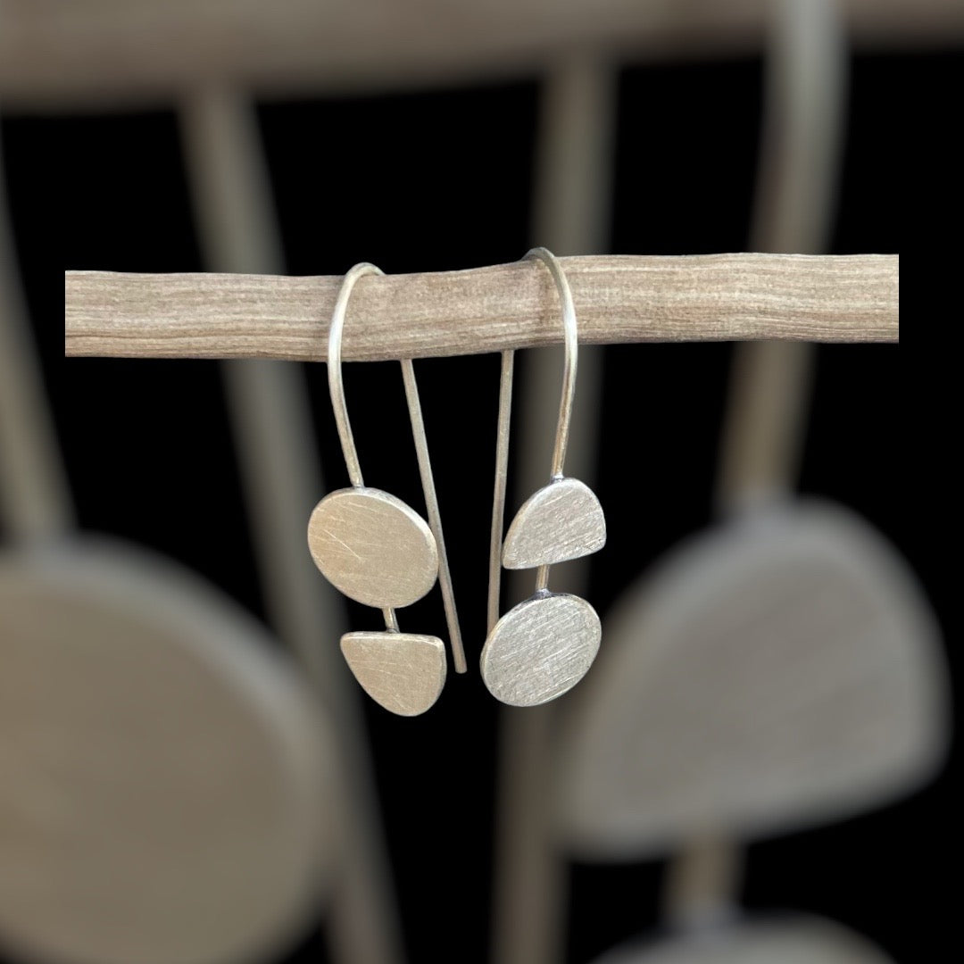 Lessons in Geometry. Same, same but different. our fabulous geometric earrings with a twist. Sterling silver.