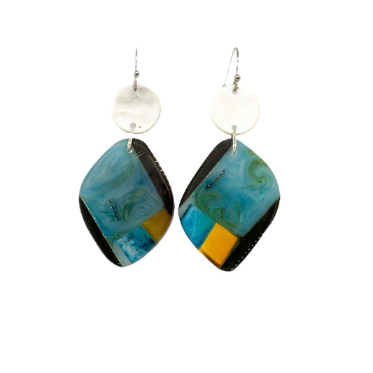 Walkerville wanderings: these bio-resin drop earrings contrast black with smokey blue and warm amber geometric accent with a brushed silver disc